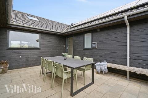 Dette lekre huset med svømmebasseng, nr. 348, med plass til 20 personer, ligger i Vestjylland