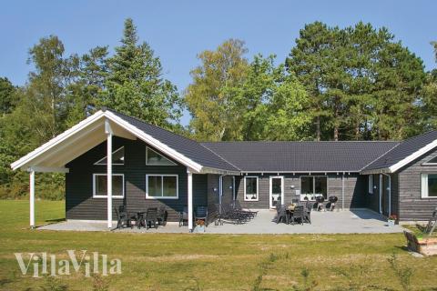 Dette lekre huset med svømmebasseng, nr. 351, med plass til 22 personer, ligger i Nordsjælland