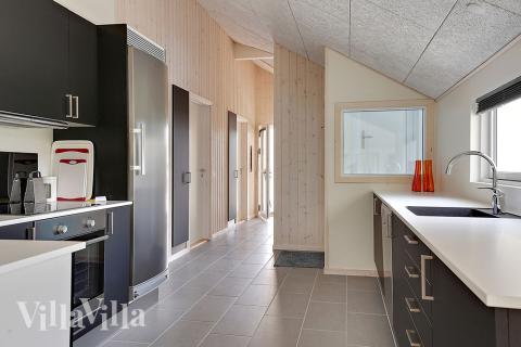 Kjøkkenet i luksushus nr. 349 er fullt utstyrt så dere lett kan lage mat til 14 personer.