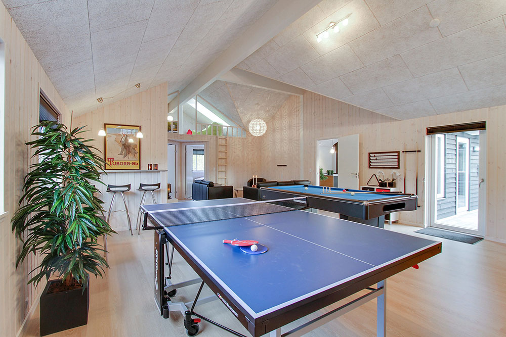 I tillegg til alle aktivitetsmulighetene i husets bassengavdeling, kan du også spille biljard, bordtennis og dart i luksushus nr. 356