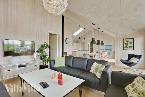 Oppholdsrom med plass til 18 i luksushus nr. 379.