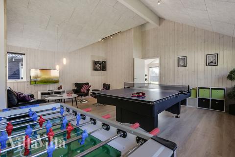 Konkurrer i feriehusets aktivitetsrom når dere besøker luksushus nr. 378 i Nordsjælland.