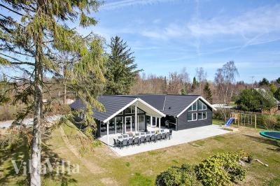 Dette lekre huset med svømmebasseng, nr. 384, med plass til 20 personer, ligger i Nordsjælland