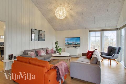 Oppholdsrom med plass til 18 i luksushus nr. 386.