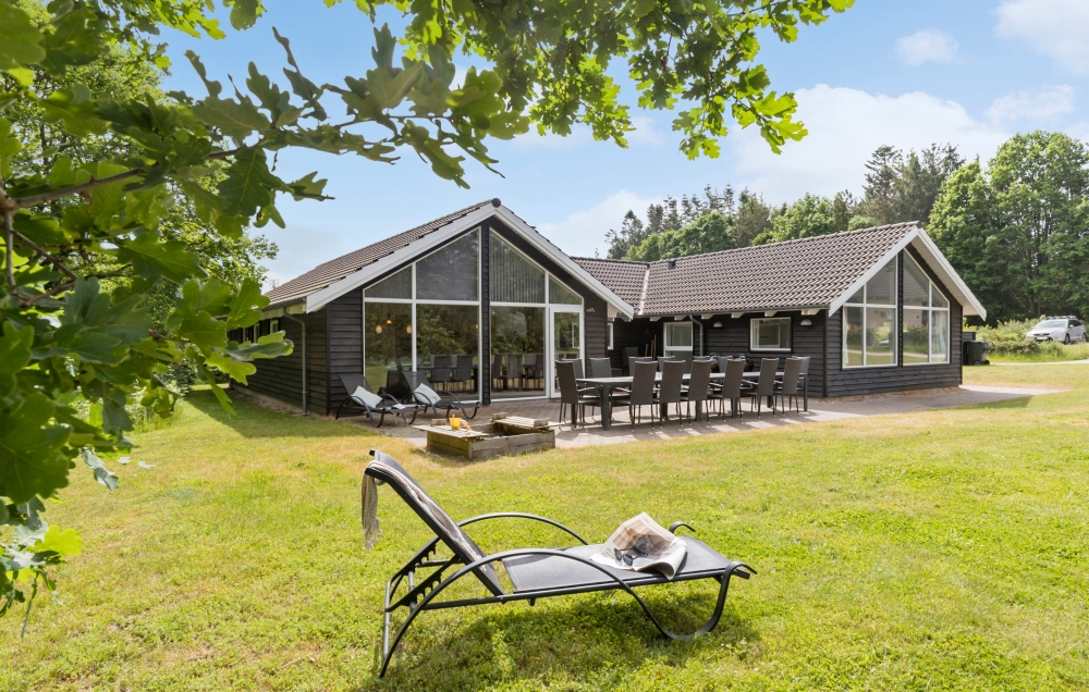 Dette lekre huset med svømmebasseng, nr. 380, med plass til 14 personer, ligger i Østjylland