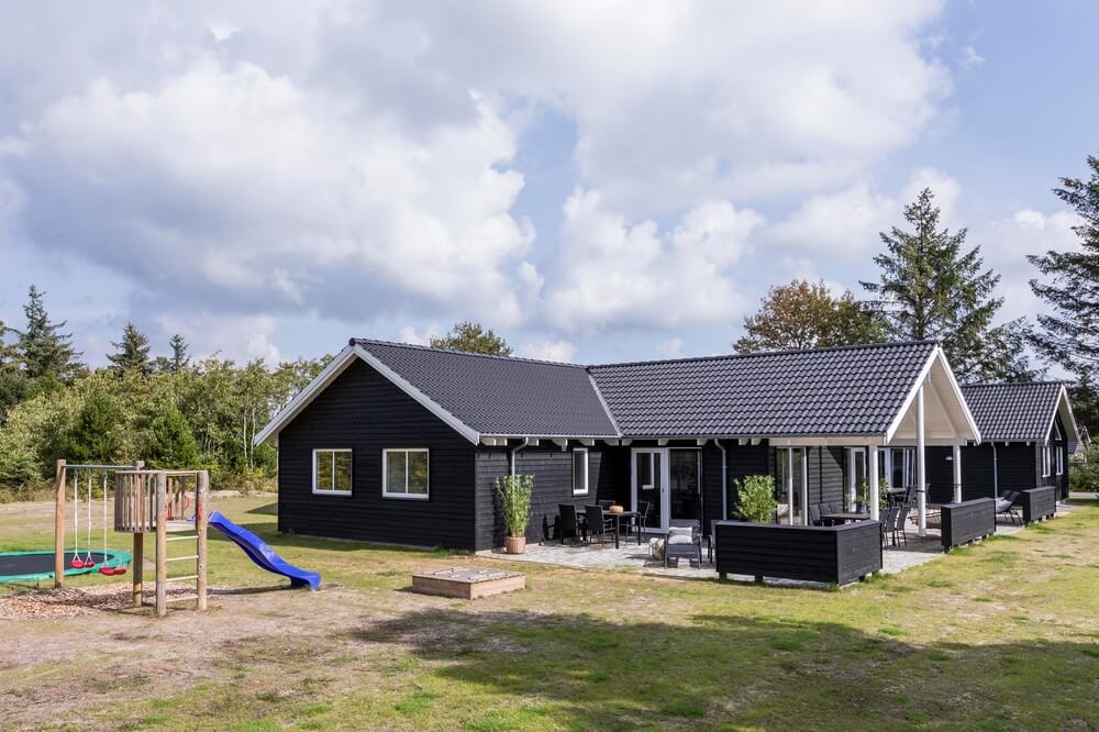Dette lekre huset med svømmebasseng, nr. 387, med plass til 24 personer, ligger i Vestjylland