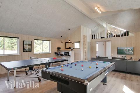 Luksushus nr. 394 til 22 personer tilbyr et stort aktivitetsrom med bl.a. biljard og dart