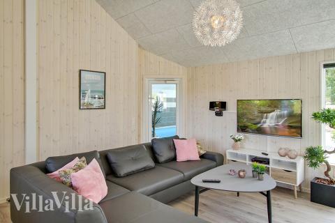 Oppholdsrom med plass til 22 i luksushus nr. 394.