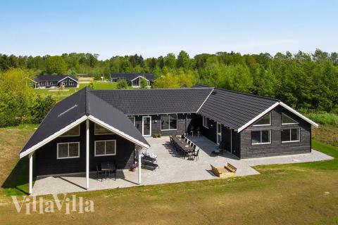 Dette lekre huset med svømmebasseng, nr. 394, med plass til 22 personer, ligger i Østjylland