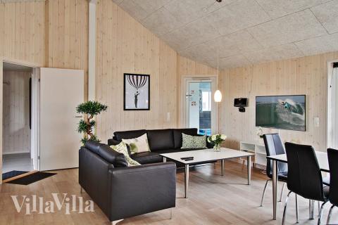 Oppholdsrom med plass til 24 i luksushus nr. 701.