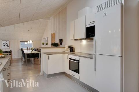 Kjøkkenet i luksushus nr. 702 er fullt utstyrt så dere lett kan lage mat til 12 personer.