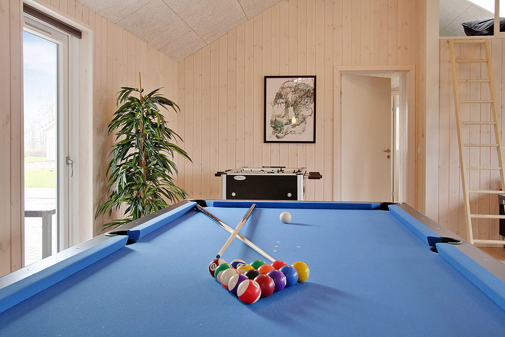 I tillegg til alle aktivitetsmulighetene i husets bassengavdeling, kan du også spille biljard, bordtennis og dart i luksushus nr. 703