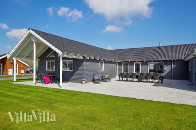Dette lekre huset med svømmebasseng, nr. 703, med plass til 20 personer, ligger i Tyskland