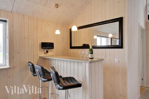 De lekre feriehusene tilbyr blant annet egen bar, som denne i luksushus nr. 703 i Tyskland