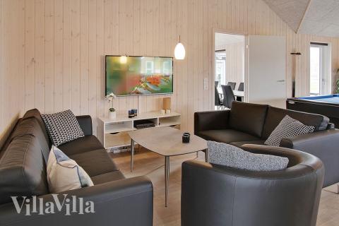 Oppholdsrom med plass til 20 i luksushus nr. 703.