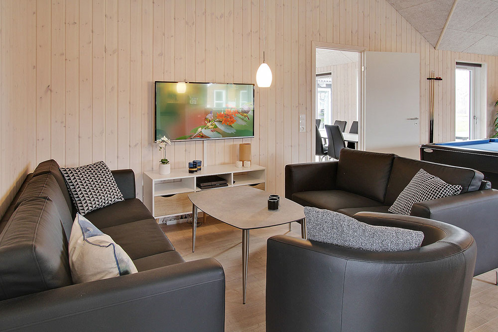Oppholdsrom med plass til 20 i luksushus nr. 703.