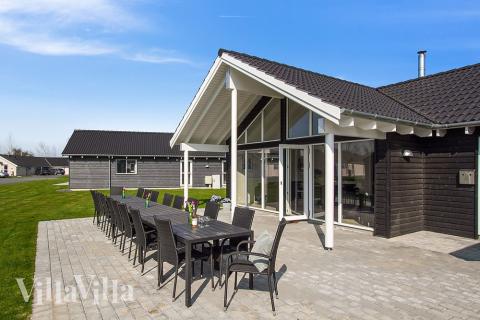 Nyt en grillkveld på terrassen i luksushus nr. 704 i Tyskland