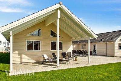 Dette lekre huset med svømmebasseng, nr. 705, med plass til 22 personer, ligger i Tyskland