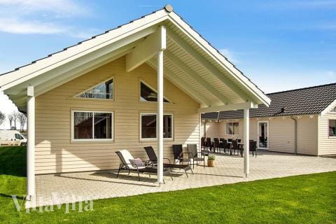 Dette lekre huset med svømmebasseng, nr. 705, med plass til 22 personer, ligger i Tyskland