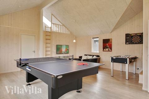 Luksushus nr. 709 til 16 personer tilbyr et stort aktivitetsrom med bl.a. biljard og dart