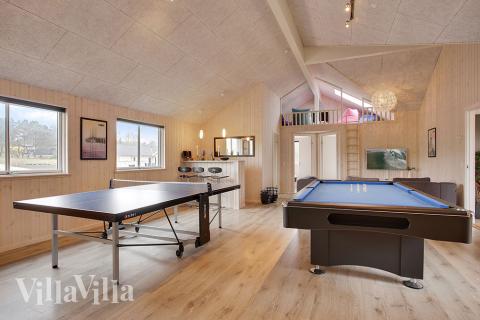 Luksushus nr. 395 til 20 personer tilbyr et stort aktivitetsrom med bl.a. biljard og dart