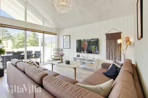 Oppholdsrom med plass til 16 i luksushus nr. 396.