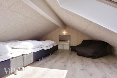 Noen av de 16 soveplassene i luksushus nr. 713 finnes på hems