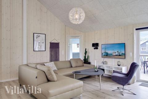 Oppholdsrom med plass til 24 i luksushus nr. 706.