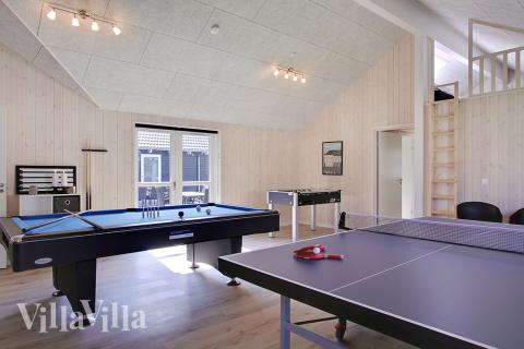 Konkurrer i feriehusets aktivitetsrom når dere besøker luksushus nr. 706 i Tyskland.