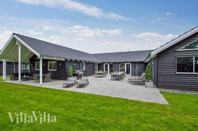 Dette lekre huset med svømmebasseng, nr. 715, med plass til 20 personer, ligger i Tyskland