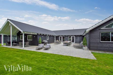 Dette lekre huset med svømmebasseng, nr. 715, med plass til 20 personer, ligger i Tyskland