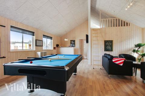 Konkurrer i feriehusets aktivitetsrom når dere besøker luksushus nr. 399 i Vestjylland.