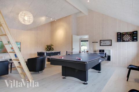 Konkurrer i feriehusets aktivitetsrom når dere besøker luksushus nr. 407 i Vestjylland.