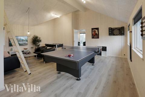 I tillegg til alle aktivitetsmulighetene i husets bassengavdeling, kan du også spille biljard, bordtennis og dart i luksushus nr. 392