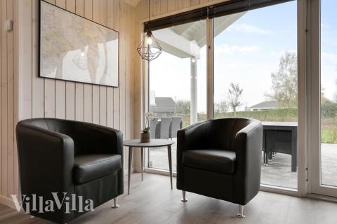 Oppholdsrom med plass til 18 i luksushus nr. 392.