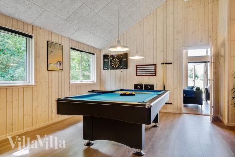 I tillegg til alle aktivitetsmulighetene i husets bassengavdeling, kan du også spille biljard, bordtennis og dart i luksushus nr. 416