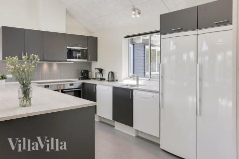 Kjøkkenet i luksushus nr. 413 er fullt utstyrt så dere lett kan lage mat til 20 personer.