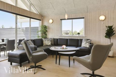 Oppholdsrom med plass til 20 i luksushus nr. 413.