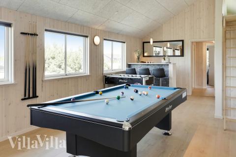 Konkurrer i feriehusets aktivitetsrom når dere besøker luksushus nr. 413 i Lolland/Falster/Møn.