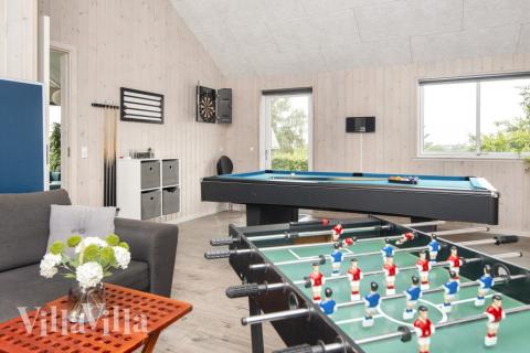 Konkurrer i feriehusets aktivitetsrom når dere besøker luksushus nr. 421 i Østjylland.