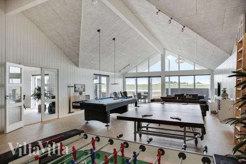 I tillegg til alle aktivitetsmulighetene i husets bassengavdeling, kan du også spille biljard, bordtennis og dart i luksushus nr. 430