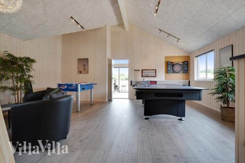 Konkurrer i feriehusets aktivitetsrom når dere besøker luksushus nr. 425 i Nordsjælland.