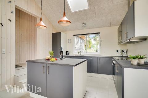 Kjøkkenet i luksushus nr. 426 er fullt utstyrt så dere lett kan lage mat til 16 personer.