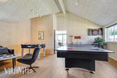 I tillegg til alle aktivitetsmulighetene i husets bassengavdeling, kan du også spille biljard, bordtennis og dart i luksushus nr. 717