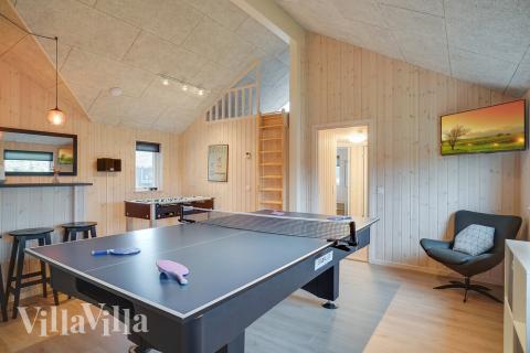 I tillegg til alle aktivitetsmulighetene i husets bassengavdeling, kan du også spille biljard, bordtennis og dart i luksushus nr. 723