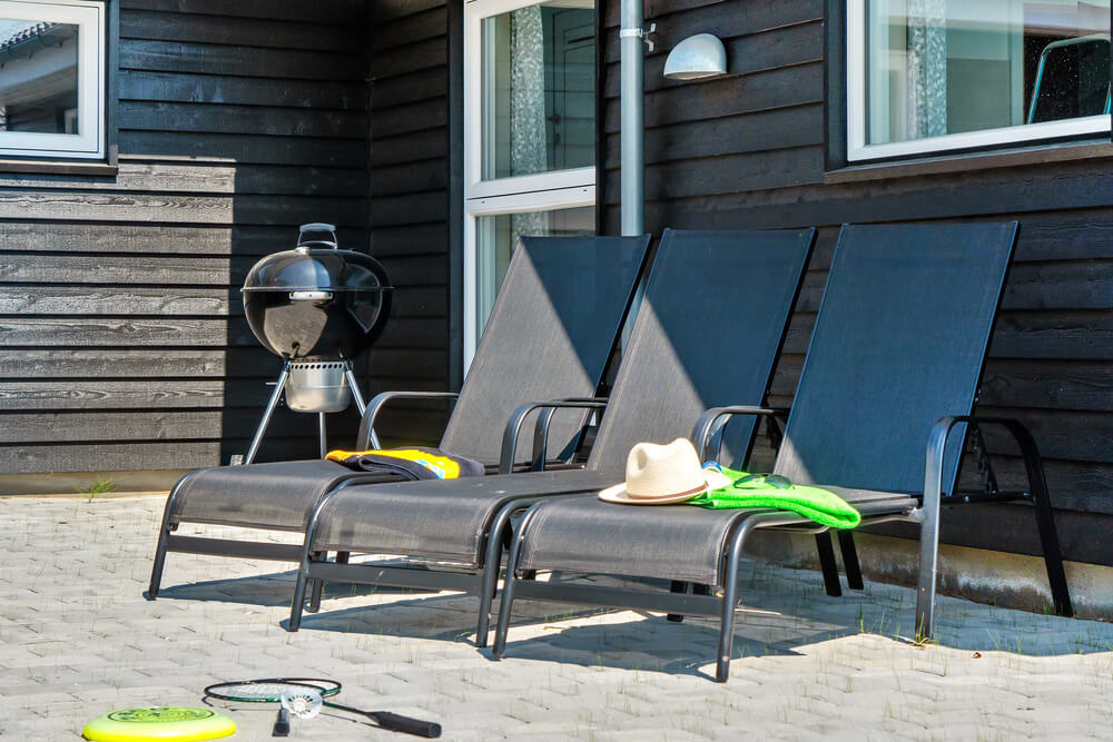 Nyt en grillkveld på terrassen i luksushus nr. 427 i Lolland/Falster/Møn