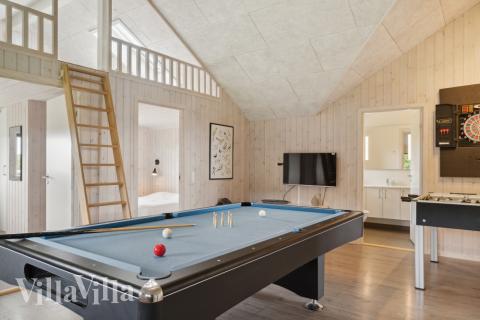 I tillegg til alle aktivitetsmulighetene i husets bassengavdeling, kan du også spille biljard, bordtennis og dart i luksushus nr. 427