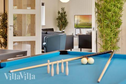 Konkurrer i feriehusets aktivitetsrom når dere besøker luksushus nr. 431 i Limfjorden.