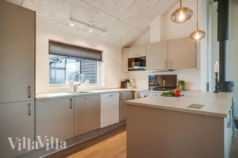 Kjøkkenet i luksushus nr. 725 er fullt utstyrt så dere lett kan lage mat til 10 personer.