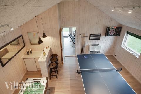 I tillegg til alle aktivitetsmulighetene i husets bassengavdeling, kan du også spille biljard, bordtennis og dart i luksushus nr. 724